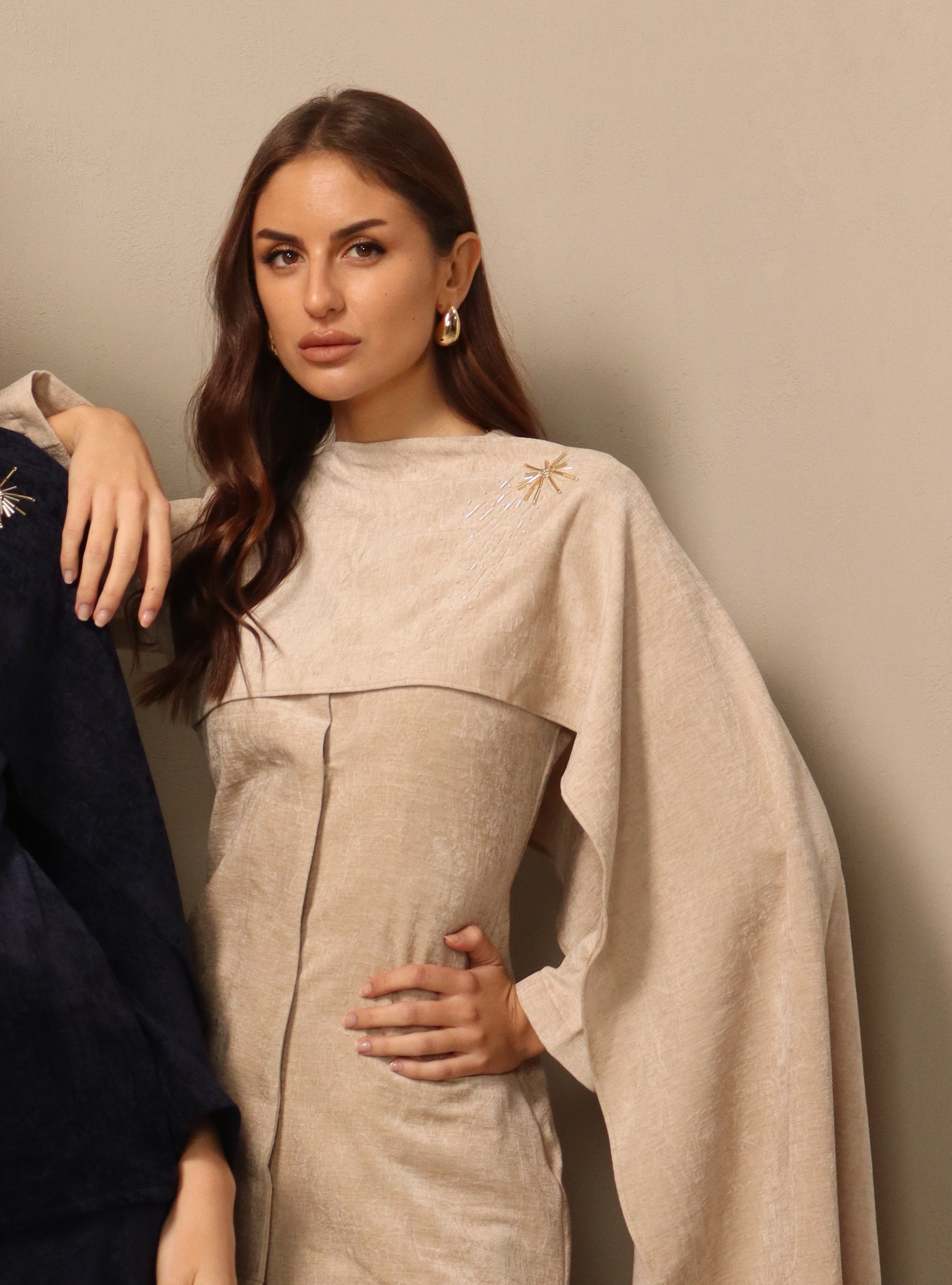 Shaikha in off-white Fay the label