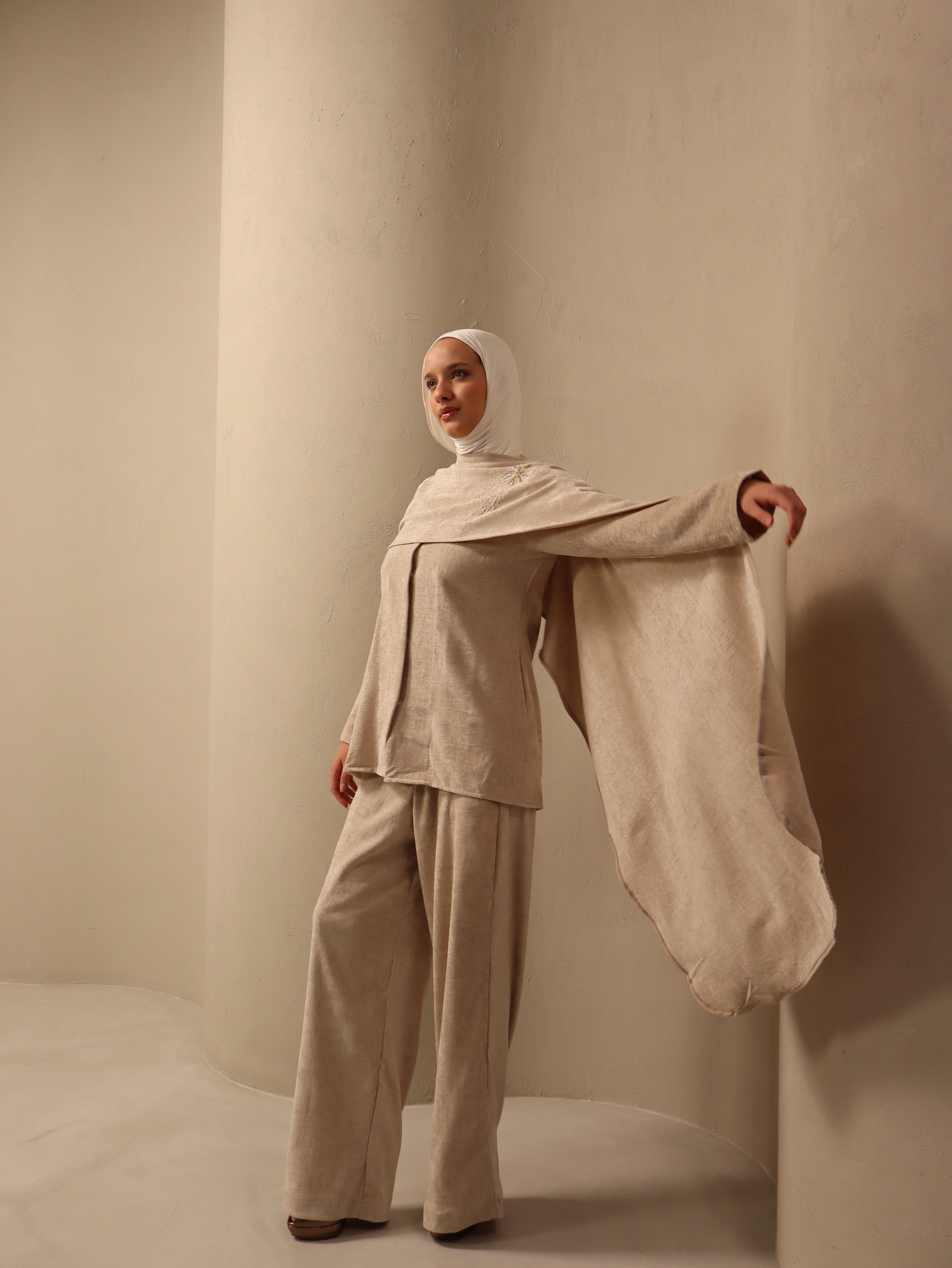 Shaikha in off-white Fay the label