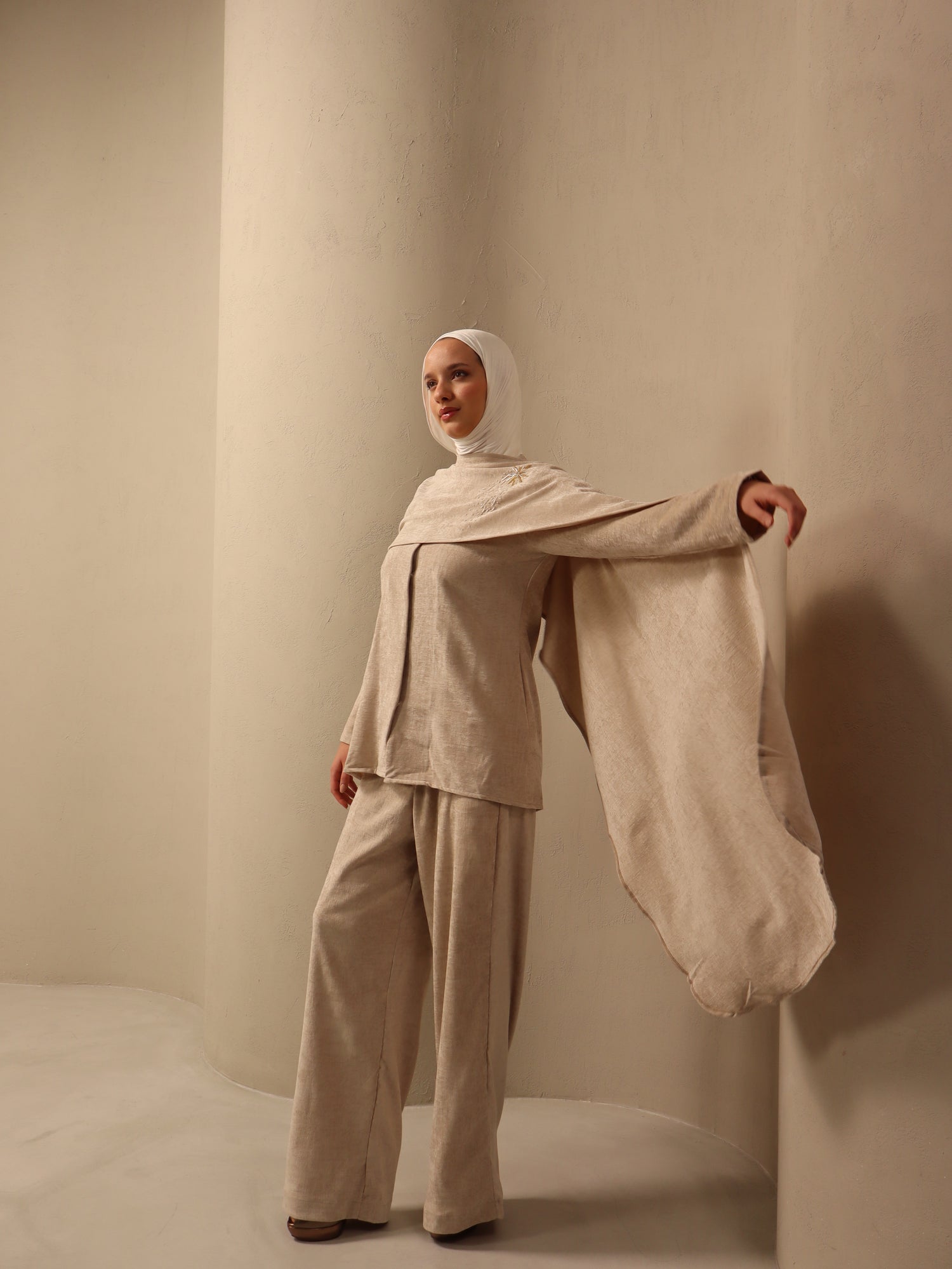 Shaikha in off-white Fay the label