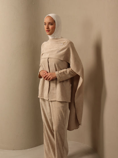 Shaikha in off-white Fay the label
